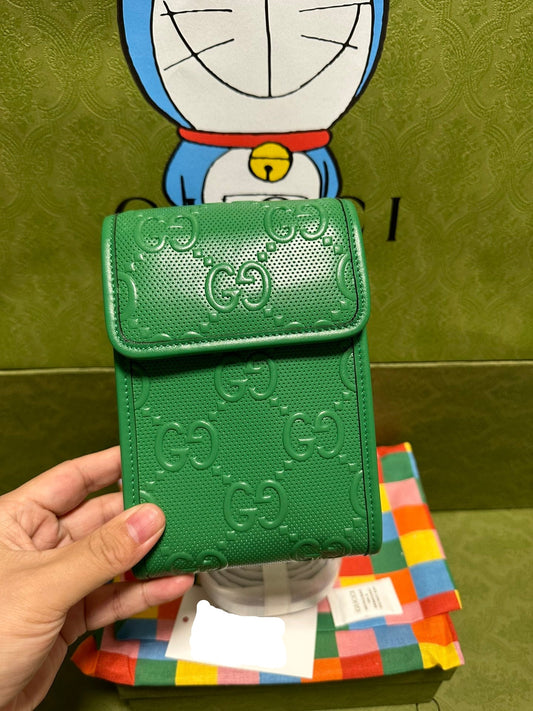 Gucci Supreme Embossed Logo Mini Phone Bag